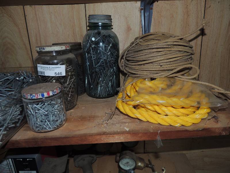 lot 546 image: 2 rolls of rope, 4  jars OF NAILS,