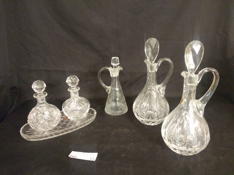 lot 33 image: Crystal cruet set & tray along with 2 Crystal bar decanters