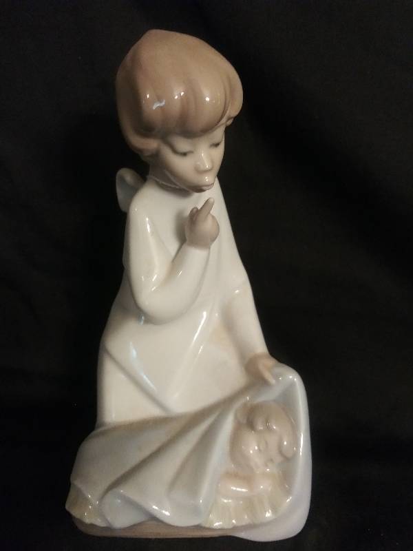 lot 63 image: Lladro- Spain porcelain Guardian angel and sleeping baby
