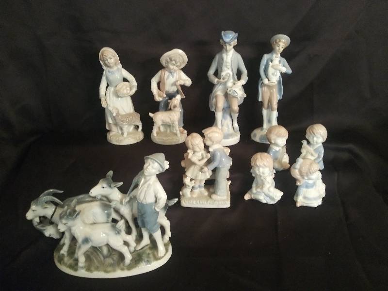lot 68 image: Porcelain Figures (total 8)- Boy with goats, Girl with basket, Boy with A goat, Little boy, little girl and a couple who doesnt like goats.