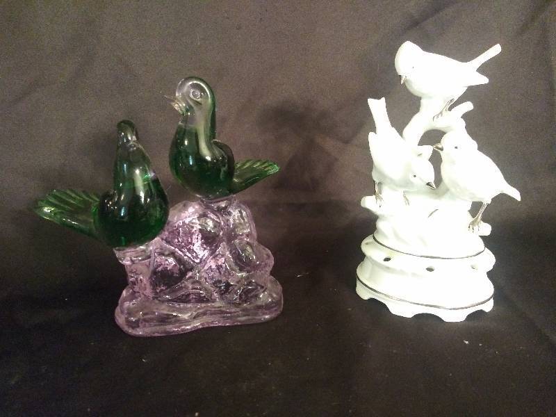 lot 78 image: 3 birds on white base made in germany and Green glass birds on lilac rock