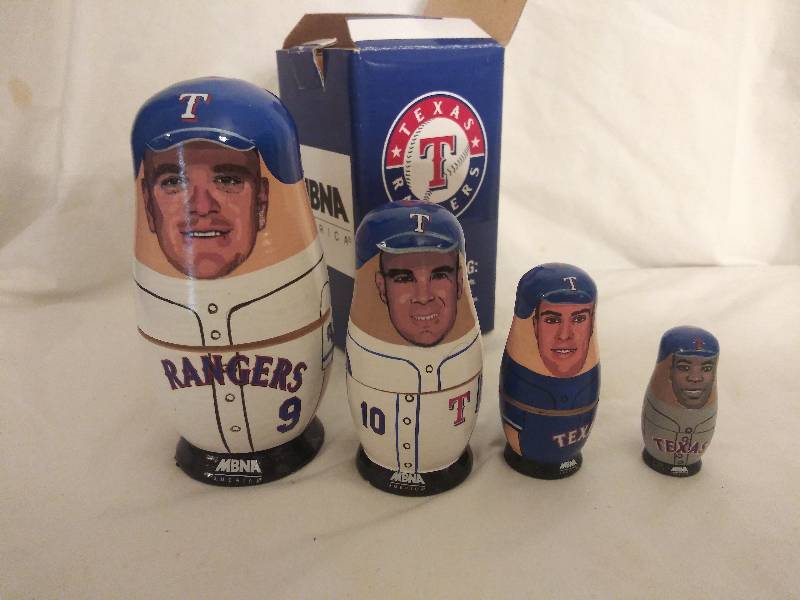 lot 82 image: Texas Ranger nesting dolls consists of 4 dolls Arctic circle brand figurine prospector panning for Gold