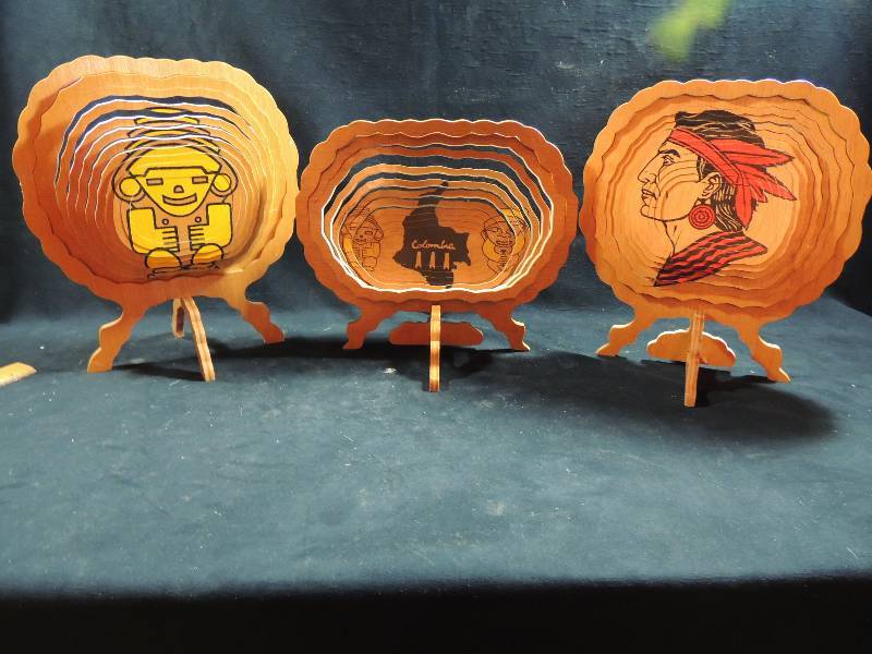 lot 223 image: South American Art -  Continuous cut wood displays -Mayan, Columbia, Indian with stands   approx. 12 x 10