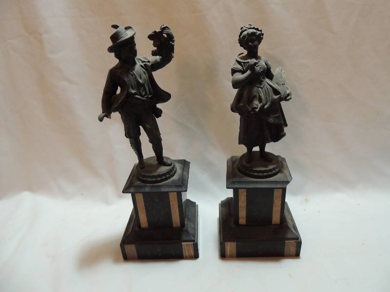 lot 226 image: Pair of Statues - Bronze on Marble base man SUITOR  holding grapes ITALIAN  and Lady with detailed dress on black and gold base 13 Ht.