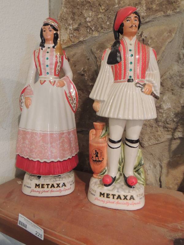 lot 228 image: METAXA decanters - Greek man 17 H Greek Lady 17 tall Hand painted Red vestdress Venison Italy
