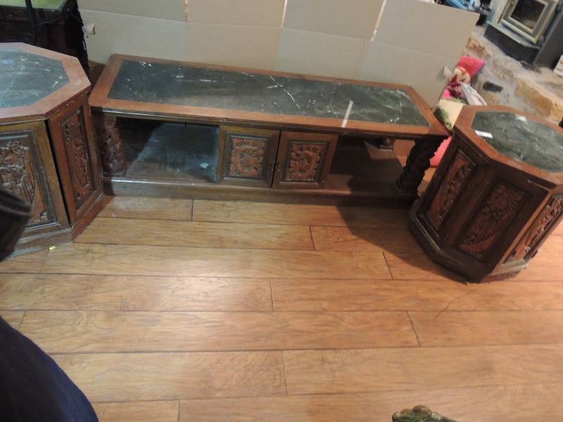 lot 234 image: Wood and green marble coffee table 60 x 20 x 18  and 2 end tables. Carved doors on  both end tables. Hexagon shaped dragons 22 x 22x 22.