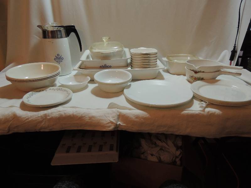 lot 152 image: Corning Ware- Coffee Pot, casserole dish, 8x8 dish, 2  12 cup dish, petite pan X 1  34 qt. Correlle bowls and plates and Comdor spouted dishes x 2