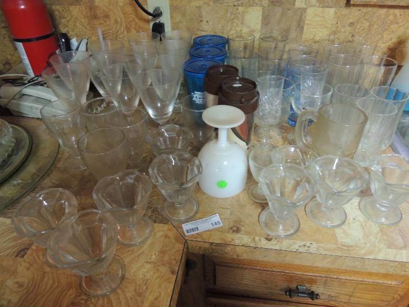 lot 145 image: Glassware- Ice tea ,juice, travel mugs, dessert  sherbet and more