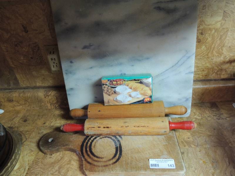lot 143 image: Marble pastry board, vintage wooden rolling pins, cutting board, and tart maker