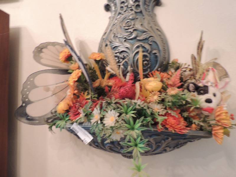 lot 248 image: Large wall sconce tea pot with floral arrangement