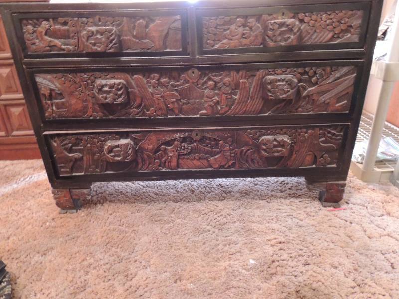 lot 269 image: 3 drawer carved chest from South America. Very ornate has glass top and dovetail drawers 42L, 28 H, 20D