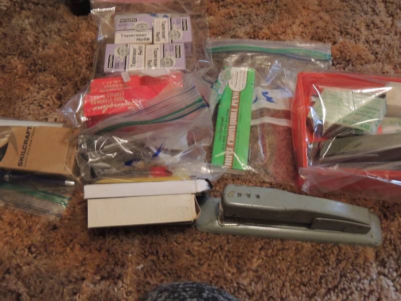 lot 275 image: Office Supplies- calculators, staplers, staples, notepads, gem clips