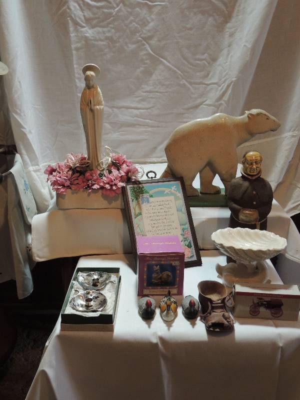 lot 291 image: Monk decanter, Angel in Floral, wooden bear, wood shoe, 2 ducks, silver-plate leaf candlesticks.