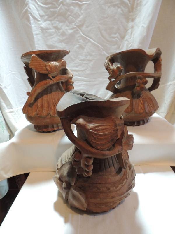 lot 292 image: Carved wooden vases with vines and birds qty.3  10 h x 7d