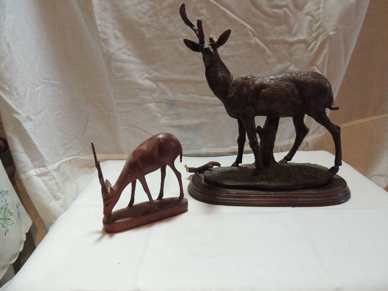 lot 304 image: Ironwood  Elk  and rosewood Gazelle - ELK - 11H X 12 L - HAS BROKEN ANTLER,  GAZELLE - 4 12 X 6L