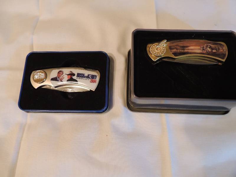 lot 324 image: Pocket knifes- Bush vs. Kerry 2004 presidential election in tin and Elephant in tin