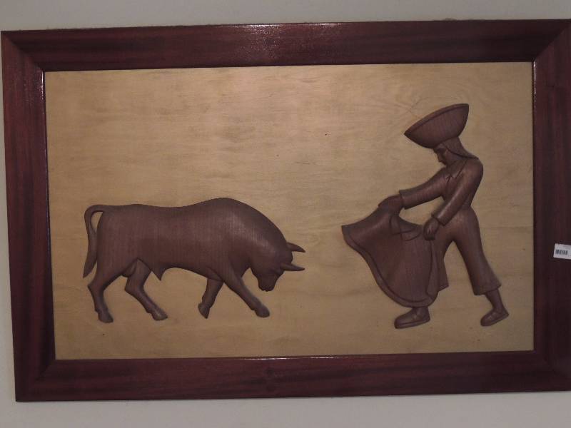 lot 330 image: Framed and matted Matador and bull (wood) 27 X 40