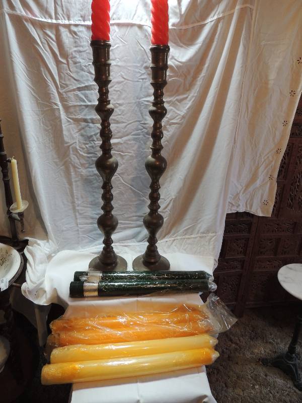 lot 283 image: Pair of  Turkish Brass candle holders 36 H 8 wide base. Comes with 4 white and 2 green unused candles 24 tall