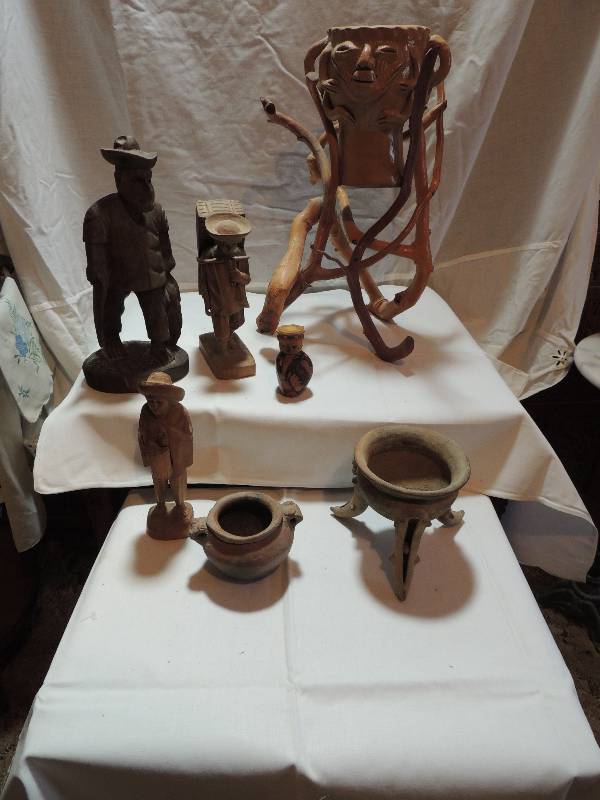 lot 289 image: South American Wood Carvings-  Mayan man  w pack - 8h, Man - 10, Face Bowl on Branch stand - 15H,  and clay pots 3 & 5H