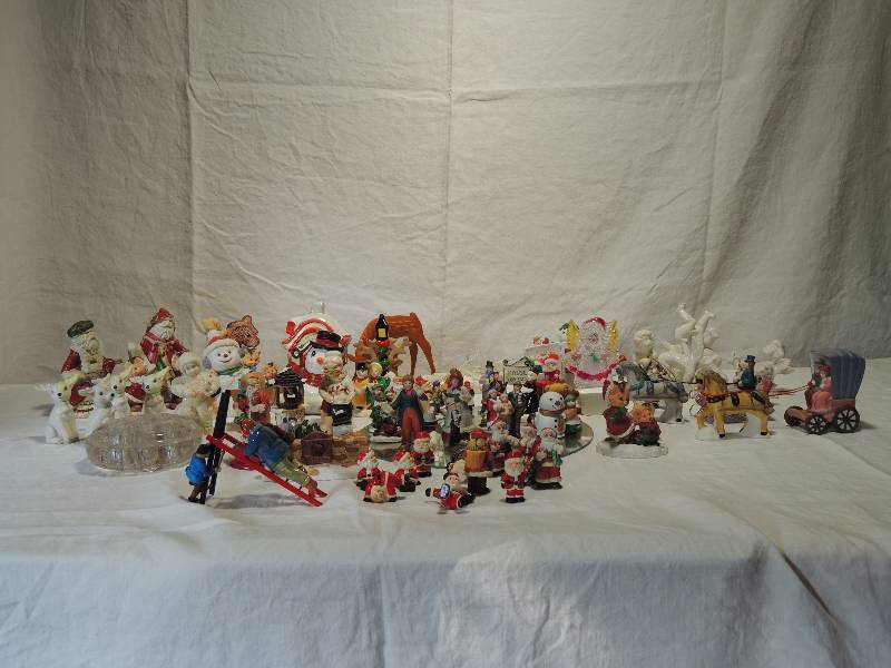 lot 421 image: Christmas Dcor- Deer, Santas, angels, Snowmen, sleighs and small figurines for village