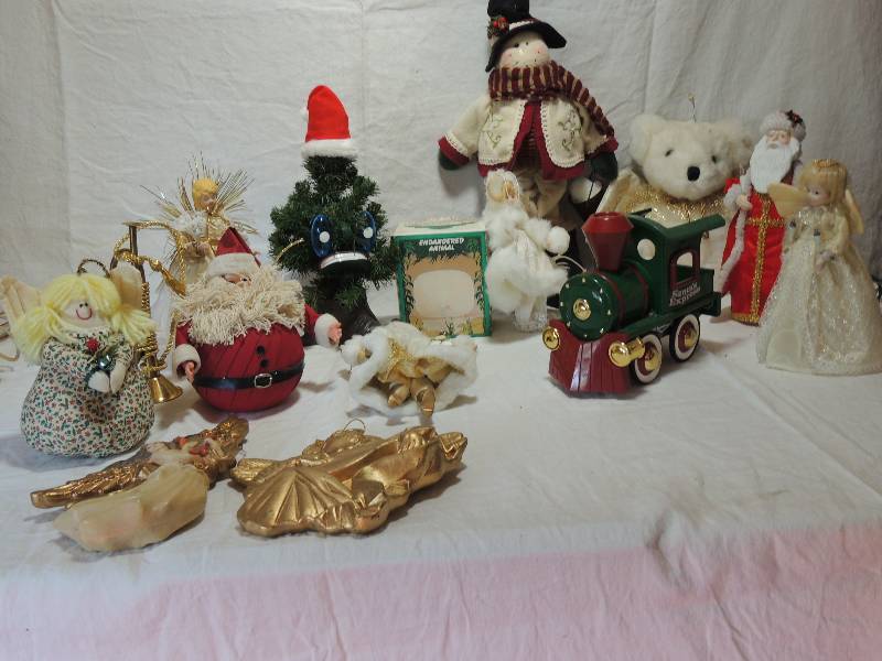 lot 445 image: Santa Express Train Engine 9 long 8  high   Bear with wings, angels, Snowmen and Santa
