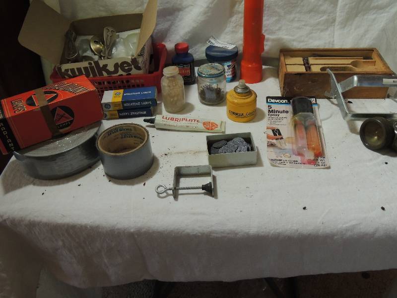 lot 489 image: Duct tape,   director chair  replacements  seat and back  x2, , Kwikset Lockset and radiant lamp corp. 200x T10 x 2