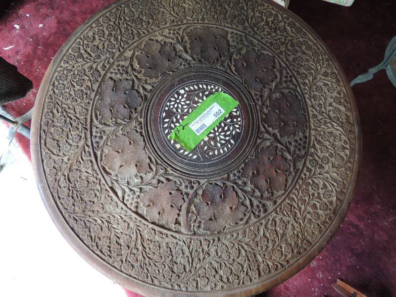 lot 502 image: Carved teak table 24 round inlay,  base trifold 25 High quantity  2