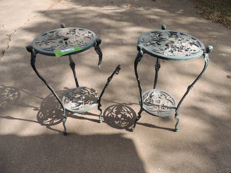 lot 503 image: 2 level plant stand grape motif x 2 one has a broken piece. 27 tall 15 Wide