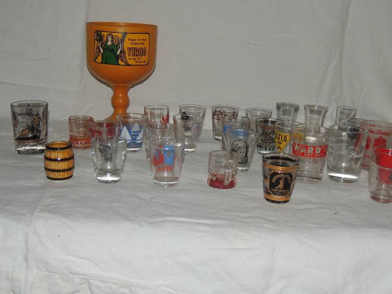 lot 343 image: 25 Various shot glasses- one for all your family members
