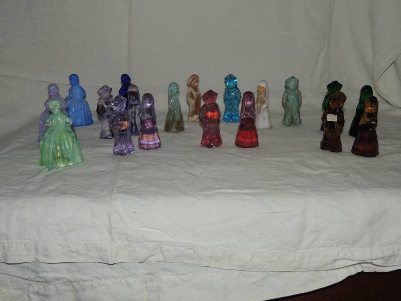 lot 345 image: Josh and jenny Figurines  qty. 15 mossier and slag glass 4 colonial lady
