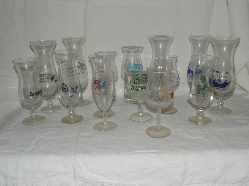 lot 351 image: Lot of hurricane glasses with various logos