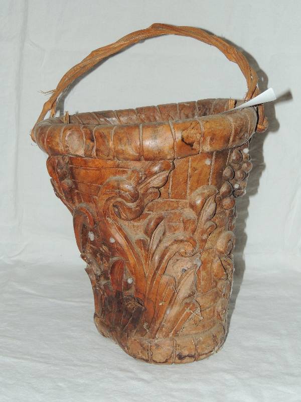 lot 352 image: wood carved basket vines and grapes has wicker handle  14 X 12 X 10