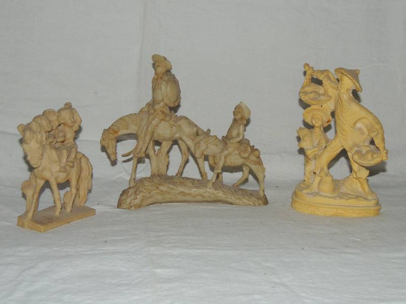 lot 355 image: Alabaster 3 figures    Asian gentleman  with child,   3 children riding horse,      Vintage santini Don Quixote and Sancho Panza