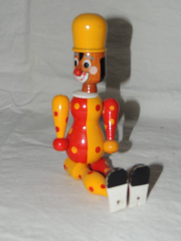 lot 356 image: Red and yellow German wooden clown jointed