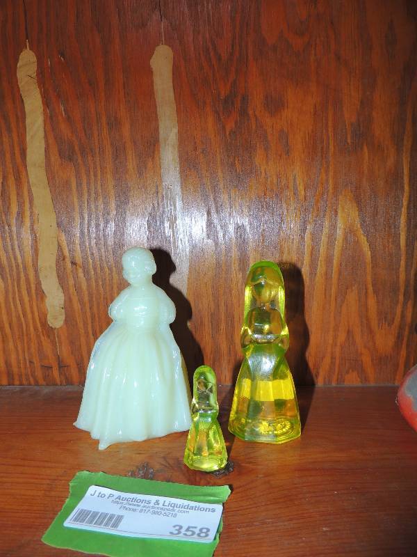 lot 358 image: Jenny Figurines IV Hunter by Mossier 4 14  & 2 12 lemon uranium glass and Colonial Lady -Custard glass