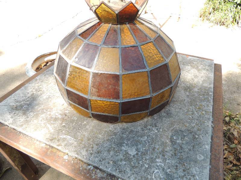 lot 651 image: Hanging lamp- Hangs from chain stained glass style amber brown orange