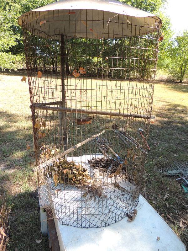 lot 660 image: Round bird cage wire used for parrot  56H  38 D plus a small birdcage for bird guests of previous parrot