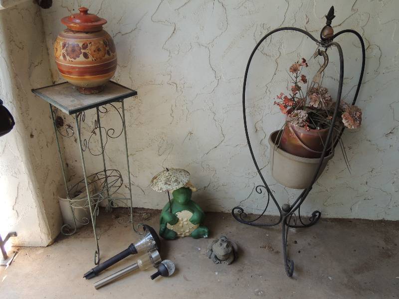 lot 661 image: Plant table, Frog heart plant hanger 3 footed clay pot and frog sprinkler