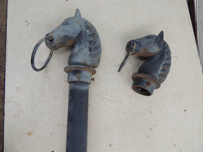 lot 650 image: HORSE HEAD HITCHING POSTS WITH RINGS  QTY 2,  10X 9   ONE WITH , POLE