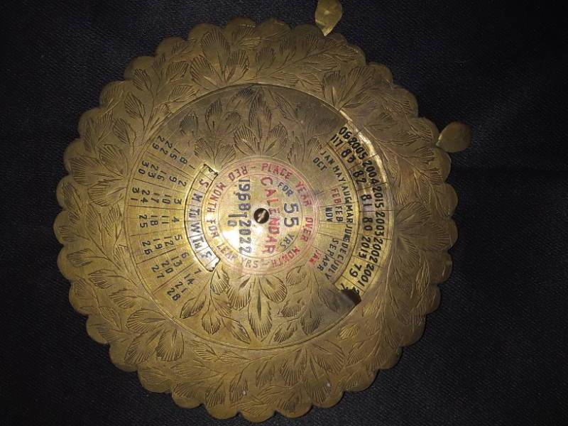 lot 94 image: Brass 55 year calendar   1968-2022