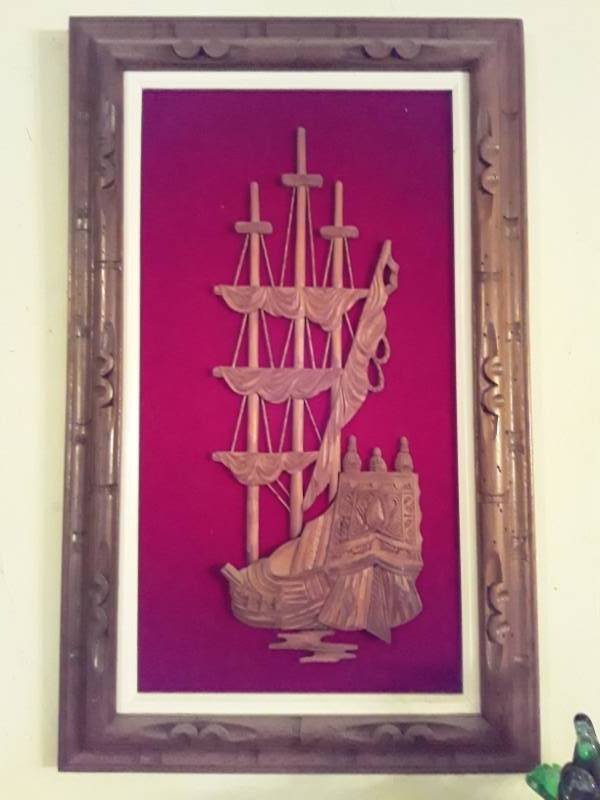 lot 91 image: 3 hand carved framed wooden ship pictures one is 30x55 and the other two are 28 x 17