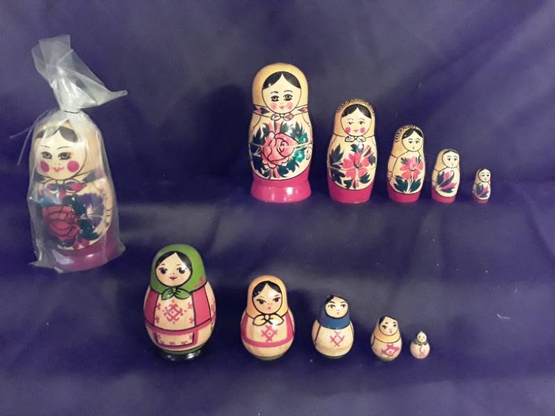 lot 118 image: Russian nesting dolls 3 sets  each set has 5 dolls made in Russia stamped on bottom