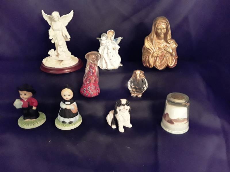 lot 109 image: 3 porcelain angels, glass angel, glass and metal elephant, and little Dutch couple 9 pieces total