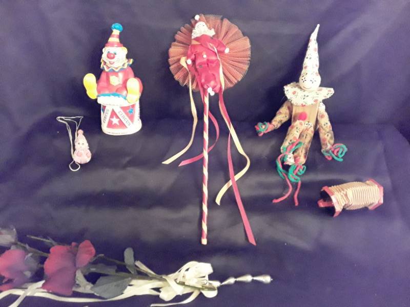 lot 119 image: Clowns- They are everywhere On a drum, on a fan , on an accordion, and a 3 doll clown