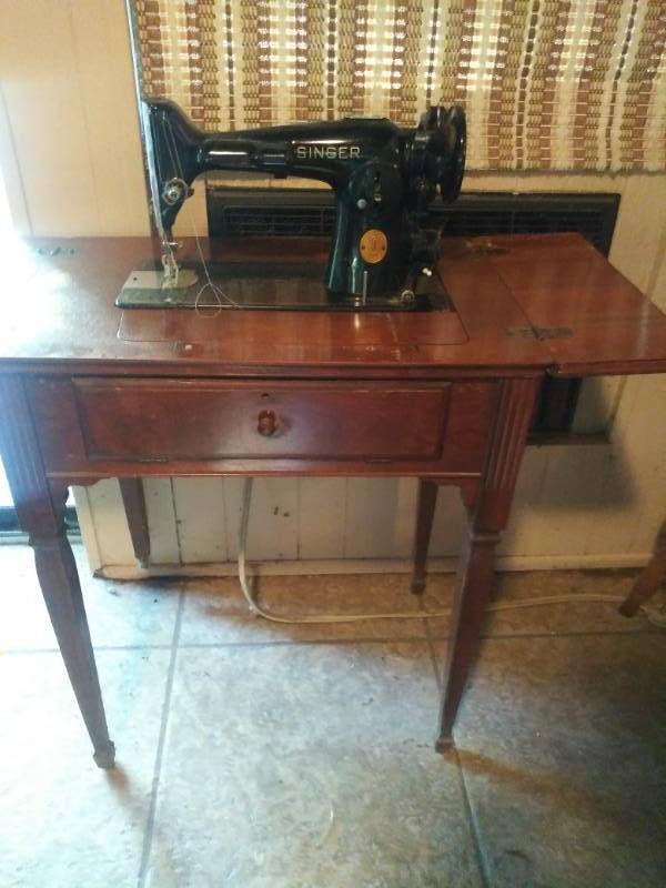 lot 396 image: Vintage Singer Sewing machine in cabinet with accessories and sewing stool ( does not come with magical sewing elf)