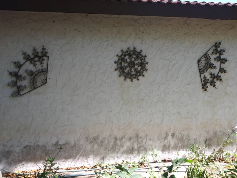 lot 668 image: 3 Ironworks wall dcor pieces can be used inside or out Large round piece is 24  the other 2 are 36x24