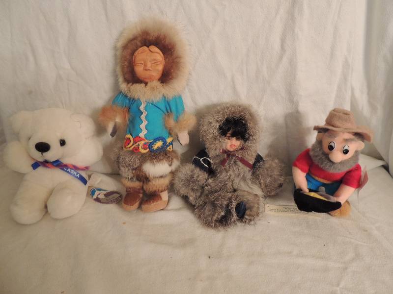 lot 88 image: Alaskan Kinnit doll 6, Alaskan wood face doll 11, White teddy bear 5 and Alaskan Gold Miner 5