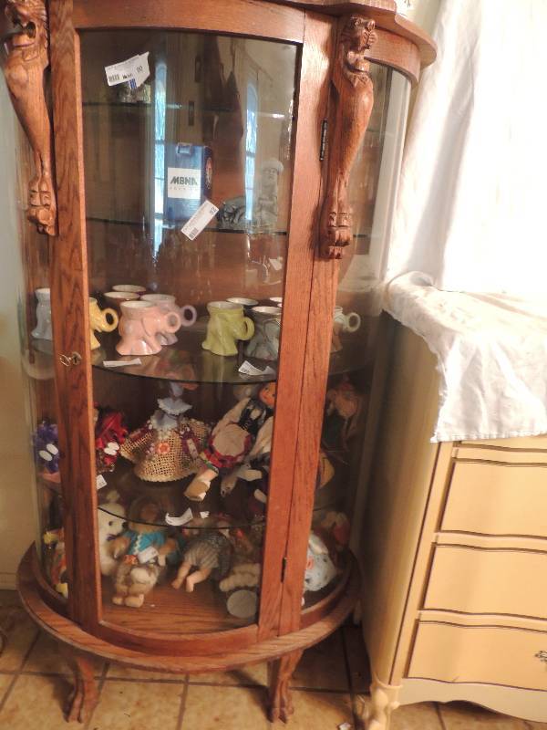 lot 90 image: Vintage Curio cabinet BOW FRONT with carved claw feet and carved lions Oak wood  58 X 34 X 16  - NO CONTENTS
