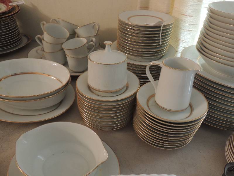lot 28 image: Noritake China. Pattern Gloria service for 12. 12 plates, bowls, berry bowls, dessert plates, salad plates,11 saucers, creamer, sugar, gravy boat, 2 serving bowls, 2 platters 12 and 14 TOTAL 90 PIECES