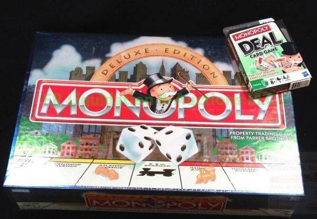lot 29 image: Deluxe Edition Monopoly unopened plus Monopoly deal